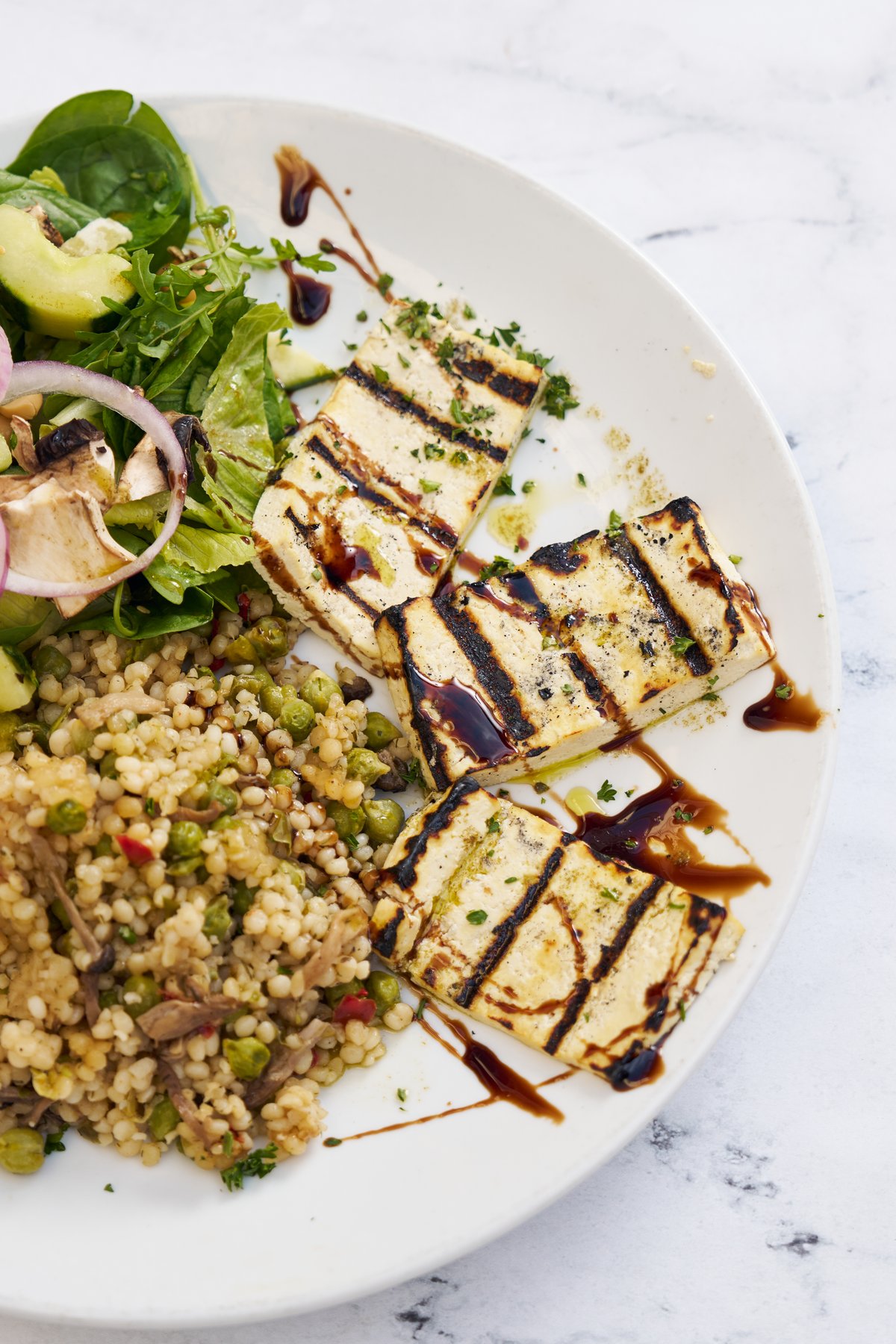 A vibrant grilled Mediterranean plate